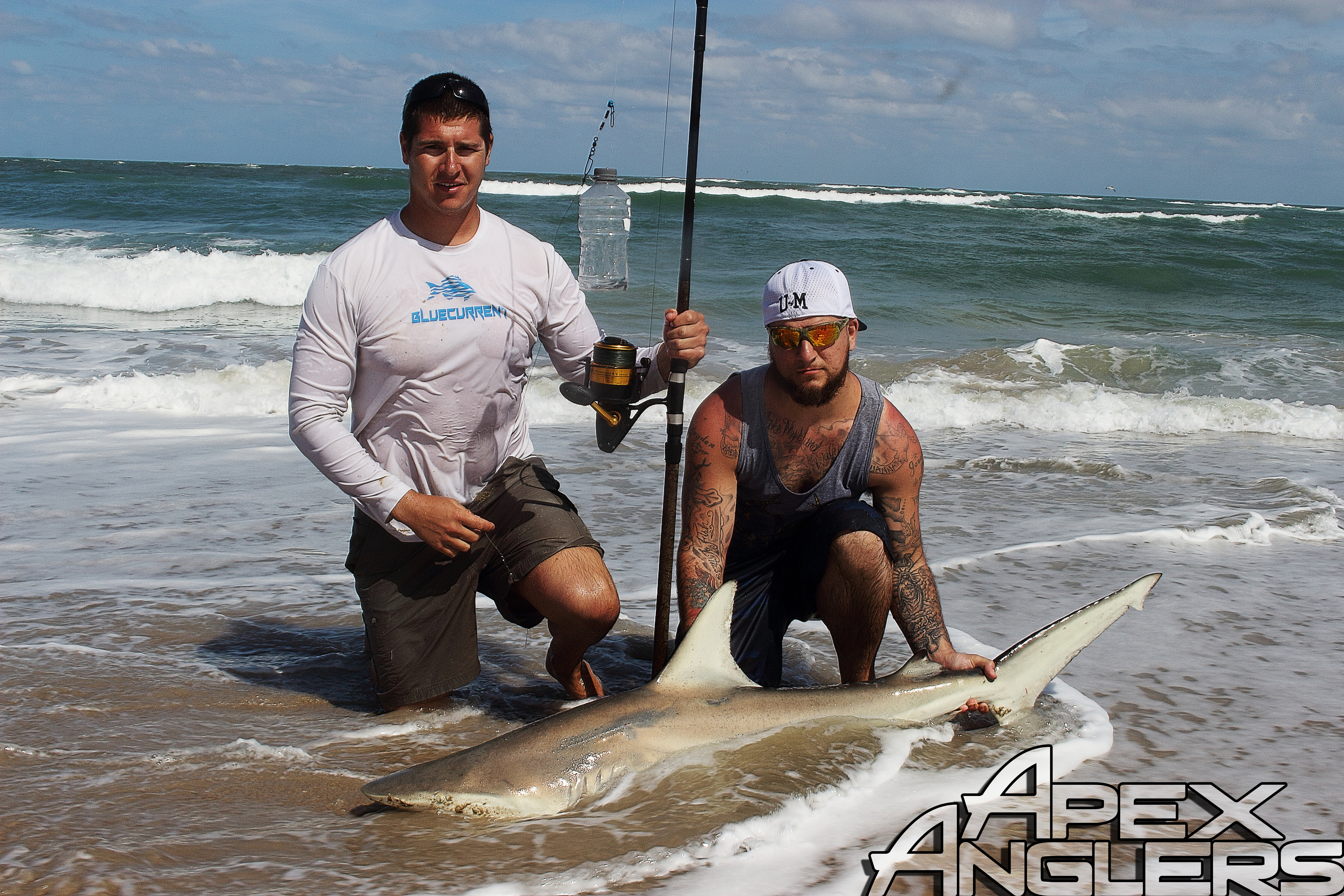 Jake Gruse and John Lusnek with John's first shark.